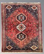A Kashgai carpet, 300 cm x 187 cm.