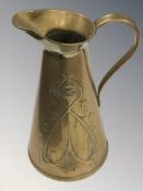 A Joseph Sankey & Sons Art Nouveau brass jug, height 29 cm.