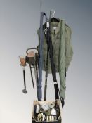 A group of fishing rods including Shakespeare, other equipment, a Regatta waist coat size XL,