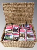 A wicker hamper containing a large quantity of Ordnance Survey maps