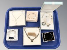 A group of silver jewellery including tri-colour necklace, bangles, etc.