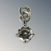 A diamond solitaire pendant, the brilliant-cut stone weighing approximately 0.
