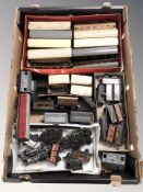 Assorted tin plate locomotives and other rolling stock.