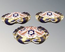 Three Royal Crown Derby Crab paperweights, two with silver stoppers,
