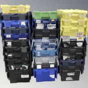 Approximately twenty nine stackable plastic lidded storage boxes, each 60 cm x 40 cm x 37 cm.
