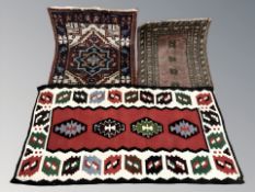 Three various Eastern mats,