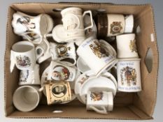 A collection of royal commemorative mugs.