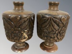 A pair of oak bulbous carvings, height 36 cm.