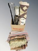 A group of rugs and weavings.