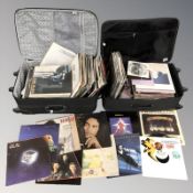 Two luggage cases containing vinyl LP records, mixed artists, Madonna, Bob Marley,