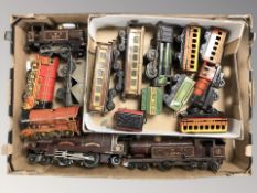 Assorted tin plate and plastic locomotives, passenger cars, etc.