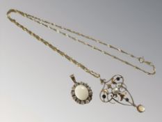 An Edwardian 9ct gold pendant on later 9ct gold twist chain,