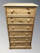 A modern pine six drawer chest, 69 cm W x 46 cm D x 132 cm H.