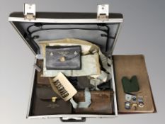 A briefcase of Masonic ephemera, silver gilt medal and two others,