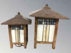Two stained glass and wooden table lamps, with metal shades, height 41 cm,