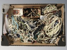 A large quantity of costume bead necklaces, simulated pearls, earrings, brooches.