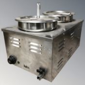 A Quattro commercial stainless steel food warmer.