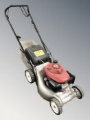 A Honda petrol lawn mower.