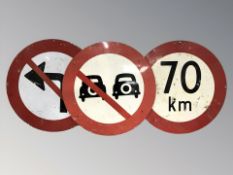 Three continental road signs, diameter 70 cm.