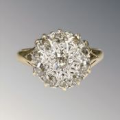 An 18ct gold old-cut diamond cluster ring, size P½ CONDITION REPORT: 4.