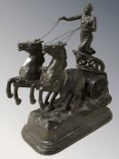 A spelter figure group of a female charioteer, height 31 cm.