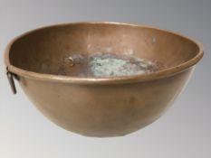 A 19th century copper bowl, diameter 33 cm.