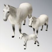 A Beswick dappled grey horse, smaller foal, tallest 20.