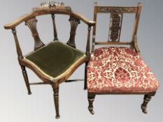 An Edwardian corner armchair and a further occasional chair.