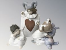 Two Nao figures of Children Numbers 1280, 1263 and Lladro figure 4539.