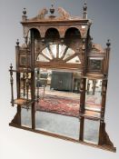 A late Victorian mahogany over mantel mirror, 120 cm W x 131 cm H x 14 cm D.