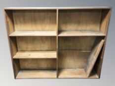 An early 20th century pine open bookcase with adjustable shelves, 167 cm W x 29 cm D x 135 cm H.