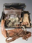 A leather holster, whip, belts, bags, etc.