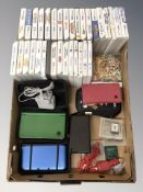 A group of Nintendo DS consoles, various games.