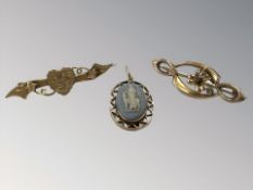 Two 9ct gold brooches and a similar Jasperware pendant CONDITION REPORT: 5.