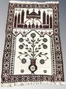 An Iranian prayer rug, 120 cm x 79 cm.
