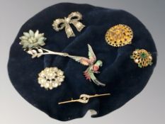 A group of decorative brooches