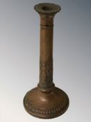 An Arts and Crafts copper candlestick, height 25 cm.