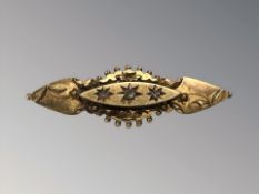 A 15ct gold diamond-set bar brooch CONDITION REPORT: 3g, including non-gold pin.