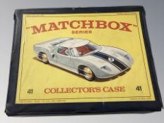 A Matchbox collector's case containing various die cast cars