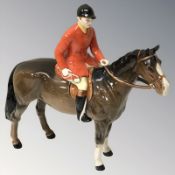 A Beswick huntsman on brown gloss horse, height 20.
