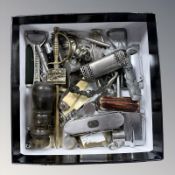 A group of pocket knives, lighters including Ronson, bottle openers, desk seal, etc.