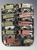 A group of 20th century tin plate locomotives and tenders.
