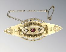 A 9ct gold ruby and diamond bar brooch, width 4.5cm CONDITION REPORT: 3.