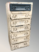 A 20th century industrial seven drawer chest,