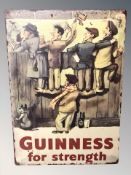 A reproduction Guinness sign, 70 cm x 50 cm.