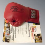 A boxing glove signed by Frank Bruno with certificate of authenticity