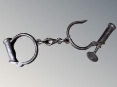 A Pair of 19th Century Hiatts Derby Handcuffs,
