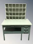 A 1930s painted pine desk, 115 cm W x 68 cm D x 76 cm H, and a similarly painted pigeon hole shelf.