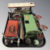 A Mamod steam engine and two trailers.