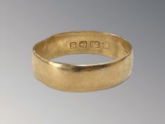 A 22ct gold band ring (misshapen) CONDITION REPORT: 4g